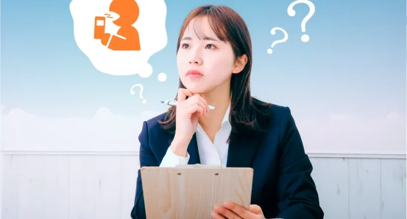 疑問を抱く人物